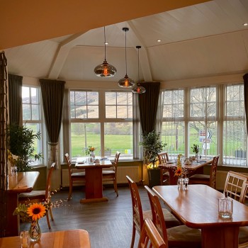 Main dining room with views over the hills