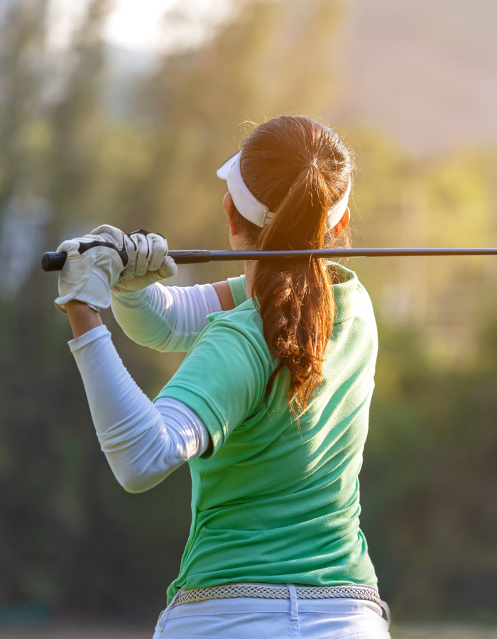 Golfer view from behing after swing