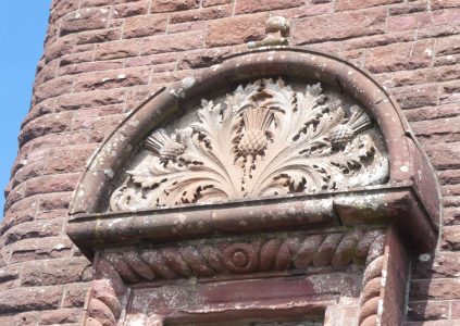 Thistle carved stone arch, at Airlie Tower