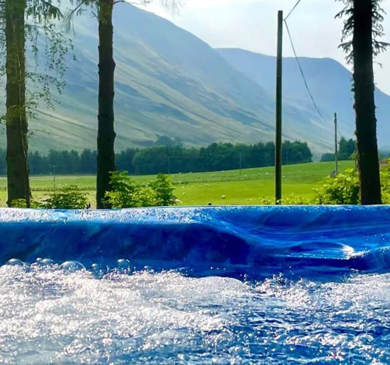 A stunning view of Glen Clova from the hot tub at The Old Manse at Glen Clova Hotel and Lodges in Scotland