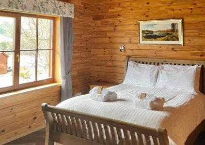King size bed in a luxury lodge Scotland