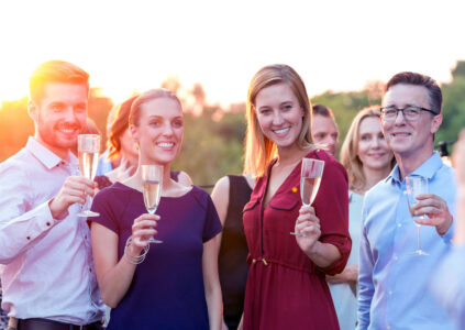 Colleagues drinking fizz at a business event